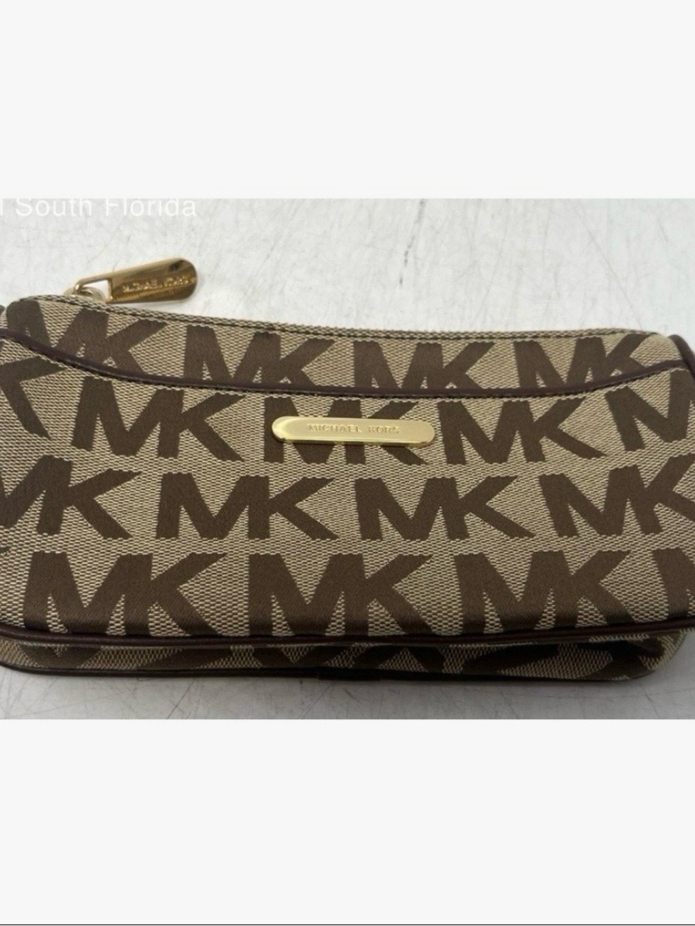 Michael Kors Brown and Tan Signature MK Wristlet with Gold Plate